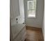 Convenient laundry room with white cabinets and a window at 101 Green Lake Dr., Myrtle Beach, SC 29572
