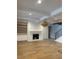 Living room with hardwood floors, fireplace, and built-in shelving at 101 Green Lake Dr., Myrtle Beach, SC 29572