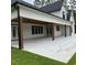 Covered patio with wooden posts and ceiling fan at 101 Green Lake Dr., Myrtle Beach, SC 29572