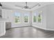 Bright dining room with hardwood floors and large windows at 1103 Bluffton Ct., Myrtle Beach, SC 29579