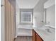 Bathroom with tub, vanity, and shower at 116 Brentwood Dr. # E, Murrells Inlet, SC 29576