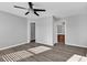 Bright bedroom with ceiling fan and access to bathroom and closet at 116 Brentwood Dr. # E, Murrells Inlet, SC 29576