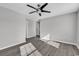 Bedroom with ceiling fan and laminate wood floor at 116 Brentwood Dr. # E, Murrells Inlet, SC 29576