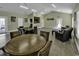 Community room features a large table and comfortable seating at 116 Brentwood Dr. # E, Murrells Inlet, SC 29576