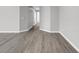 Bright hallway with gray walls and wood-look vinyl flooring at 116 Brentwood Dr. # E, Murrells Inlet, SC 29576