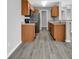 Modern kitchen with wood cabinets and black appliances at 116 Brentwood Dr. # E, Murrells Inlet, SC 29576