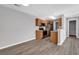 Modern kitchen with wood cabinets and black appliances at 116 Brentwood Dr. # E, Murrells Inlet, SC 29576