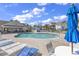 Relaxing kidney-shaped pool with plenty of lounge chairs at 116 Brentwood Dr. # E, Murrells Inlet, SC 29576
