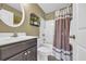 Bathroom with brown vanity and shower/tub combo at 122 Robert Conway Ct., Georgetown, SC 29440