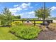 Windsor Farms entrance sign with landscaping and a black fence at 146 Springtide Dr., Conway, SC 29527