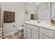 Clean bathroom with white vanity and shower/tub combo at 157 Ella Kinley Circle # 303, Myrtle Beach, SC 29588
