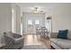 Bright dining area with hardwood floors and French doors to balcony at 157 Ella Kinley Circle # 303, Myrtle Beach, SC 29588