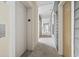 Clean and well-lit hallway with access to elevator and units at 157 Ella Kinley Circle # 303, Myrtle Beach, SC 29588