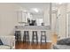 Kitchen features breakfast bar with three stools at 157 Ella Kinley Circle # 303, Myrtle Beach, SC 29588