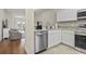 Modern kitchen with stainless steel appliances and granite countertops at 157 Ella Kinley Circle # 303, Myrtle Beach, SC 29588