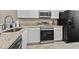 Modern kitchen with stainless steel appliances and granite countertops at 157 Ella Kinley Circle # 303, Myrtle Beach, SC 29588