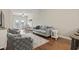 Spacious living room features hardwood floors and access to balcony at 157 Ella Kinley Circle # 303, Myrtle Beach, SC 29588