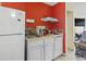 Small kitchen with white cabinets and appliances at 1600 S Ocean Blvd. # 312, Myrtle Beach, SC 29577
