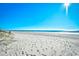 Sunny beach view with footprints in the sand at 200 S Ocean Blvd. # 3-B, North Myrtle Beach, SC 29582