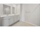 Double vanity bathroom with a large shower and tile floor at 219 Marauder Dr., Longs, SC 29568