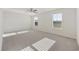 Bright bedroom with carpet, ceiling fan and two windows at 219 Marauder Dr., Longs, SC 29568