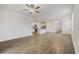 Open concept kitchen and living area with hardwood floors at 219 Marauder Dr., Longs, SC 29568