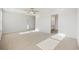 Main bedroom with carpet, ceiling fan and en-suite bathroom at 219 Marauder Dr., Longs, SC 29568