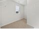 Spacious walk-in closet with wire shelving and window at 219 Marauder Dr., Longs, SC 29568