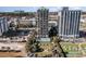 Aerial view of oceanfront building with pool and lawn at 2310 North Ocean Blvd. # 201, Myrtle Beach, SC 29577
