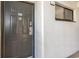 Exterior condo entrance with dark gray door, number 201 at 2310 North Ocean Blvd. # 201, Myrtle Beach, SC 29577