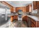 Modern kitchen featuring stainless steel appliances and wood cabinets at 2379 Morlynn Dr., Myrtle Beach, SC 29577