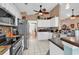 Modern kitchen with stainless steel appliances, white cabinets, and granite countertops at 238 Cold Water Circle, Myrtle Beach, SC 29588