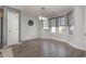 Spacious dining area with bay window and wood-look flooring at 295 Four Leaf Ln., Murrells Inlet, SC 29576