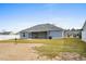 House exterior showcasing backyard and screened porch at 3125 Belgrove Ln., Conway, SC 29526