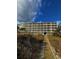 Building exterior, beach access path, and dune landscape at 3217 S Ocean Blvd. S, North Myrtle Beach, SC 29582