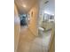 Hallway view with access to bathroom and living room at 3217 S Ocean Blvd. S, North Myrtle Beach, SC 29582