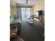 Living room with ocean view and balcony access at 3217 S Ocean Blvd. S, North Myrtle Beach, SC 29582