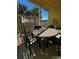 Small patio table and chairs with ocean view at 3217 S Ocean Blvd. S, North Myrtle Beach, SC 29582