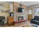 Brick fireplace as a focal point in the living room at 327 55Th Ave. N, North Myrtle Beach, SC 29582