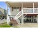 House exterior with stairs and deck at 327 55Th Ave. N, North Myrtle Beach, SC 29582