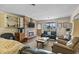 Cozy living room with a brick fireplace and access to a deck at 327 55Th Ave. N, North Myrtle Beach, SC 29582