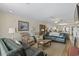 Spacious living room with ample seating and views into kitchen at 327 55Th Ave. N, North Myrtle Beach, SC 29582