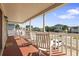 Spacious front porch with rocking chairs at 327 55Th Ave. N, North Myrtle Beach, SC 29582