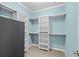 Walk-in closet featuring built-in shelving and ample storage space, perfect for organizing wardrobes at 3716 Mackevans Ct., Myrtle Beach, SC 29579