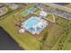 Aerial of community pool, and a covered lounge area surrounded by pristine landscaping at 3716 Mackevans Ct., Myrtle Beach, SC 29579