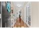 Inviting entryway featuring hardwood floors, a console table with decor, and French doors at 3716 Mackevans Ct., Myrtle Beach, SC 29579