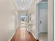 Inviting entryway featuring hardwood floors, console table with decor, and an open doorway at 3716 Mackevans Ct., Myrtle Beach, SC 29579