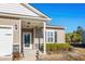 A welcoming front entrance, featuring a glass paneled door and tidy landscaping at 3716 Mackevans Ct., Myrtle Beach, SC 29579