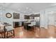 Modern kitchen features stainless steel appliances, granite countertops, dark cabinets, and a kitchen island at 3716 Mackevans Ct., Myrtle Beach, SC 29579