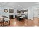 Modern kitchen with dark cabinetry, granite counters, and stainless steel appliances at 3716 Mackevans Ct., Myrtle Beach, SC 29579